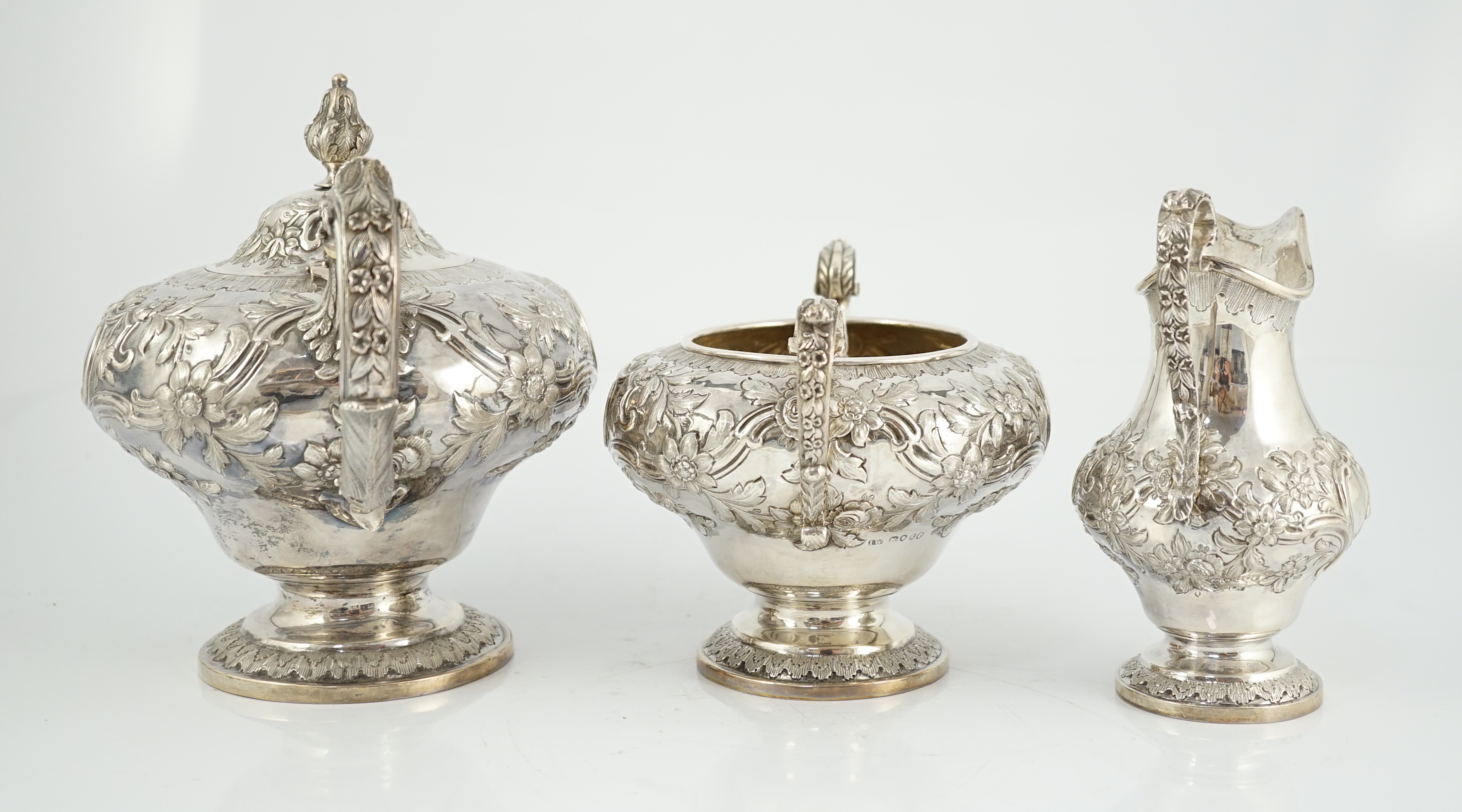 A Victorian silver inverted pear shaped three piece tea set by John Wellby